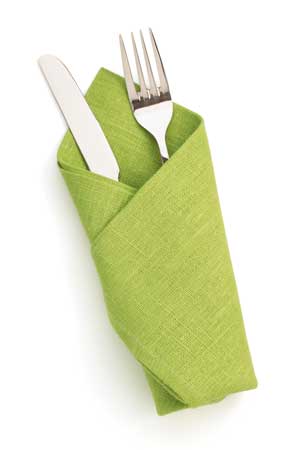Knife and form in green napkin